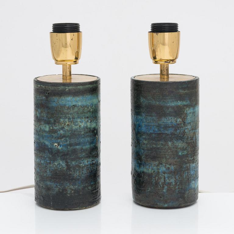 A pair of tablelamps by Pirkko Pylvänäinen, ceramics and brass, signed PP -68.