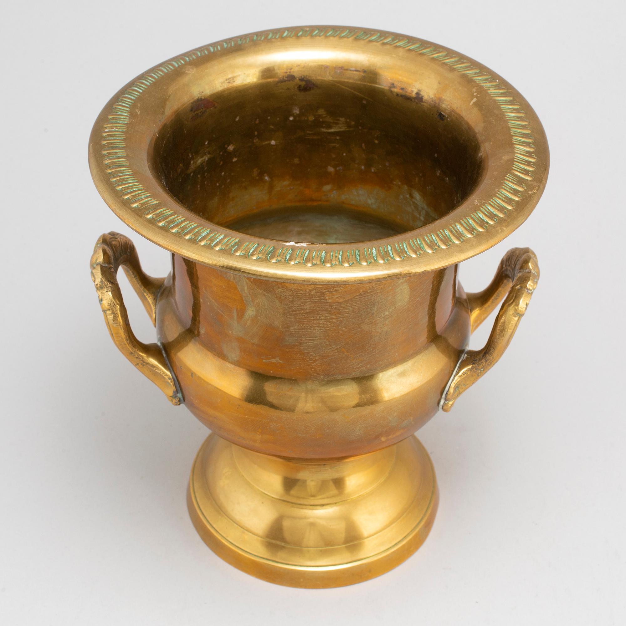 A first half of the 20th century brass champagne cooler.