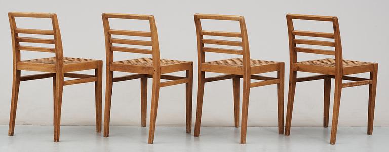 A set of four beech chairs, France 1920's-30's.