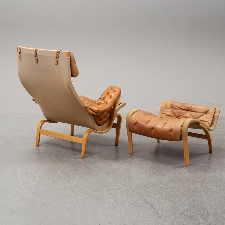 Bruno Mathsson, a "Pernilla" lounge chair with ottoman, DUX, Sweden, late 1900's.