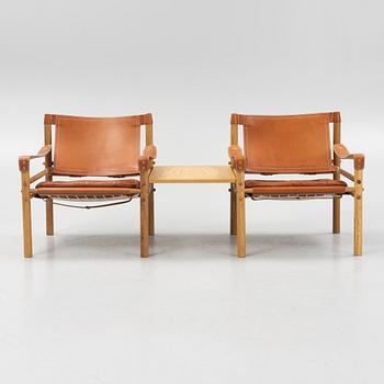 Arne Norell, fåtöljer, ett par med bordsskiva, "Sirocco", Norell Möbel AB.