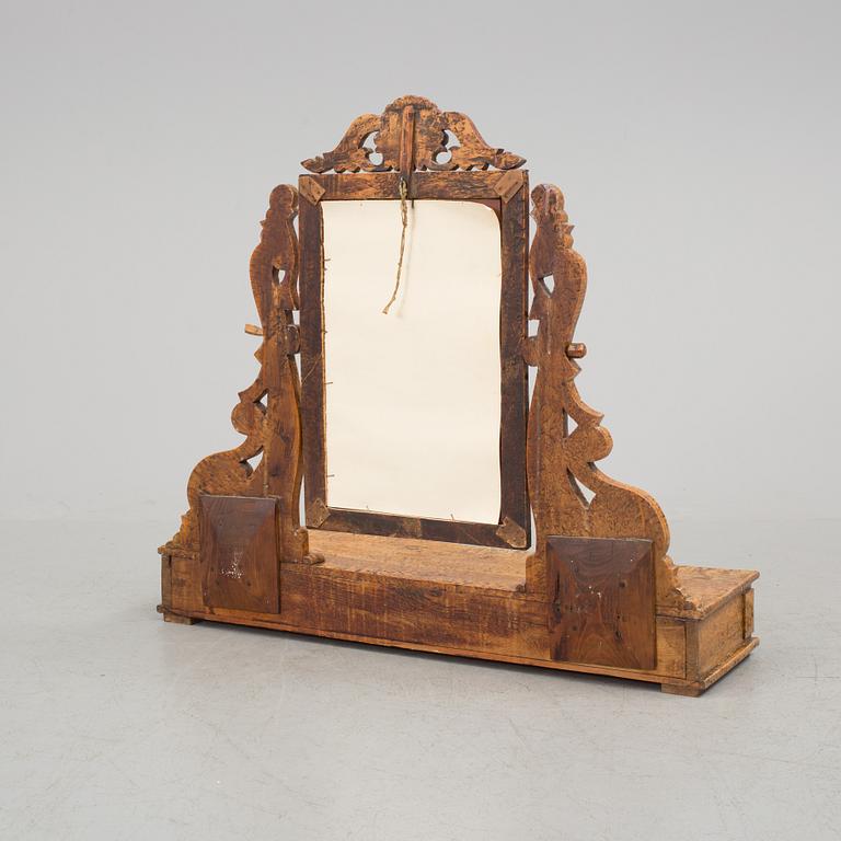 A late 19th century table mirror.