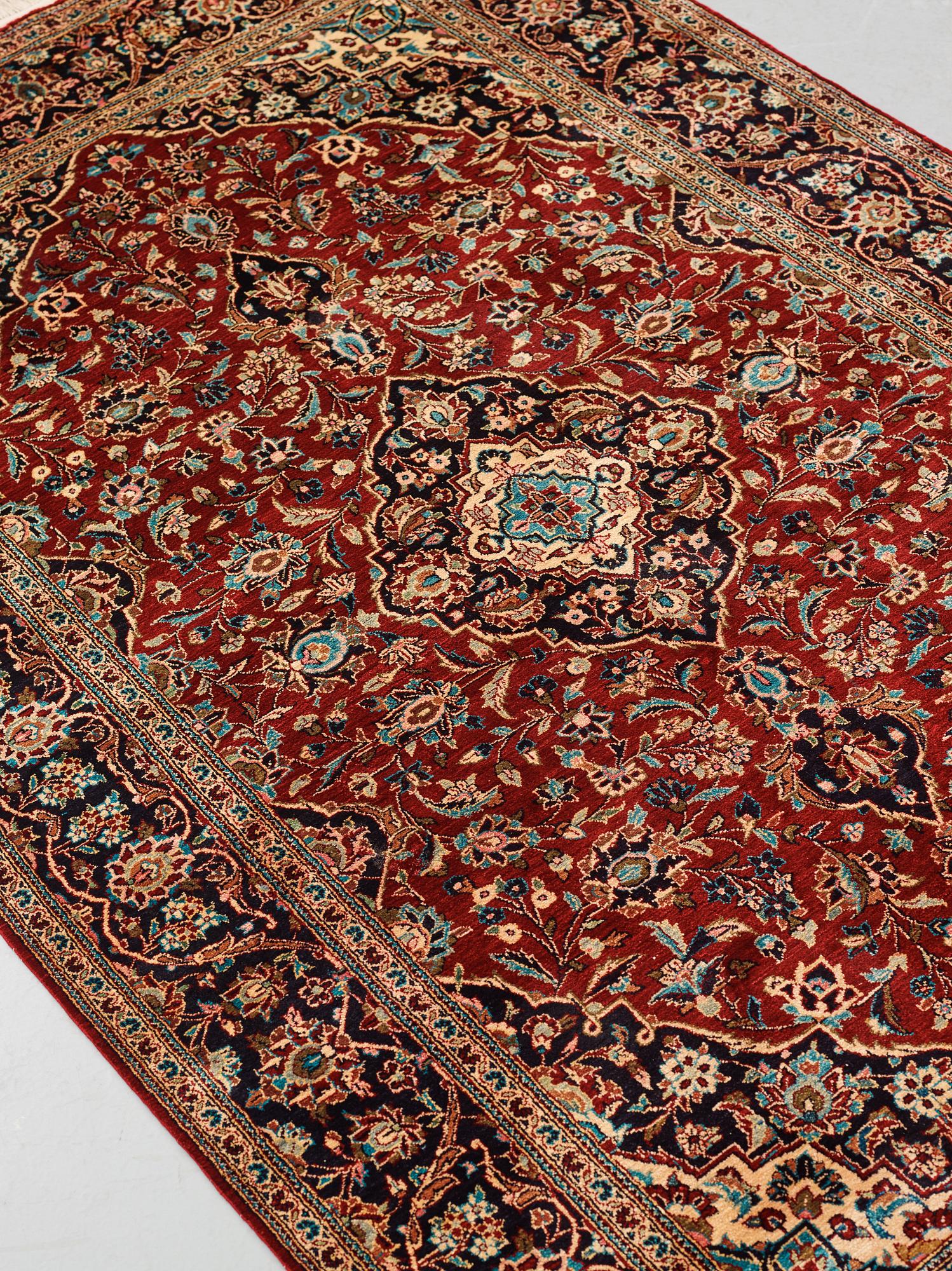 A rug, Old, silk Kashan, ca 224 x 138,5 cm.