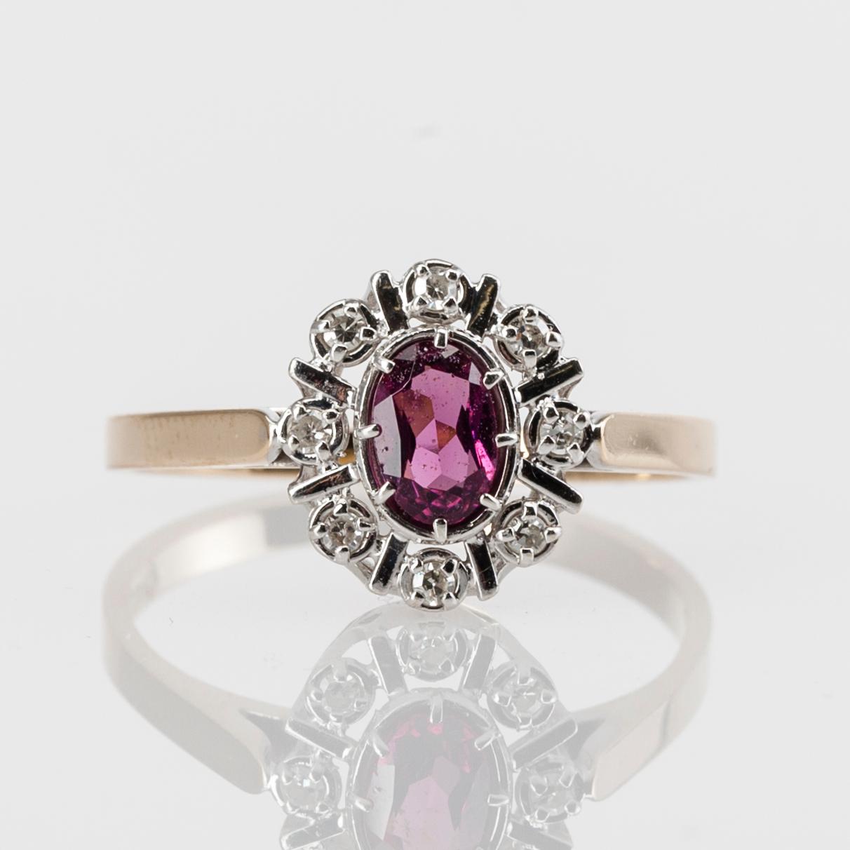 RING, 14K guld, diamanter tot. 0,10 ct och granat, Morris Lindblom, Åbo 1986. Vikt 2,5 g.