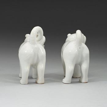 A set of two blanc de chine mythological animals, late Qing dynasty.