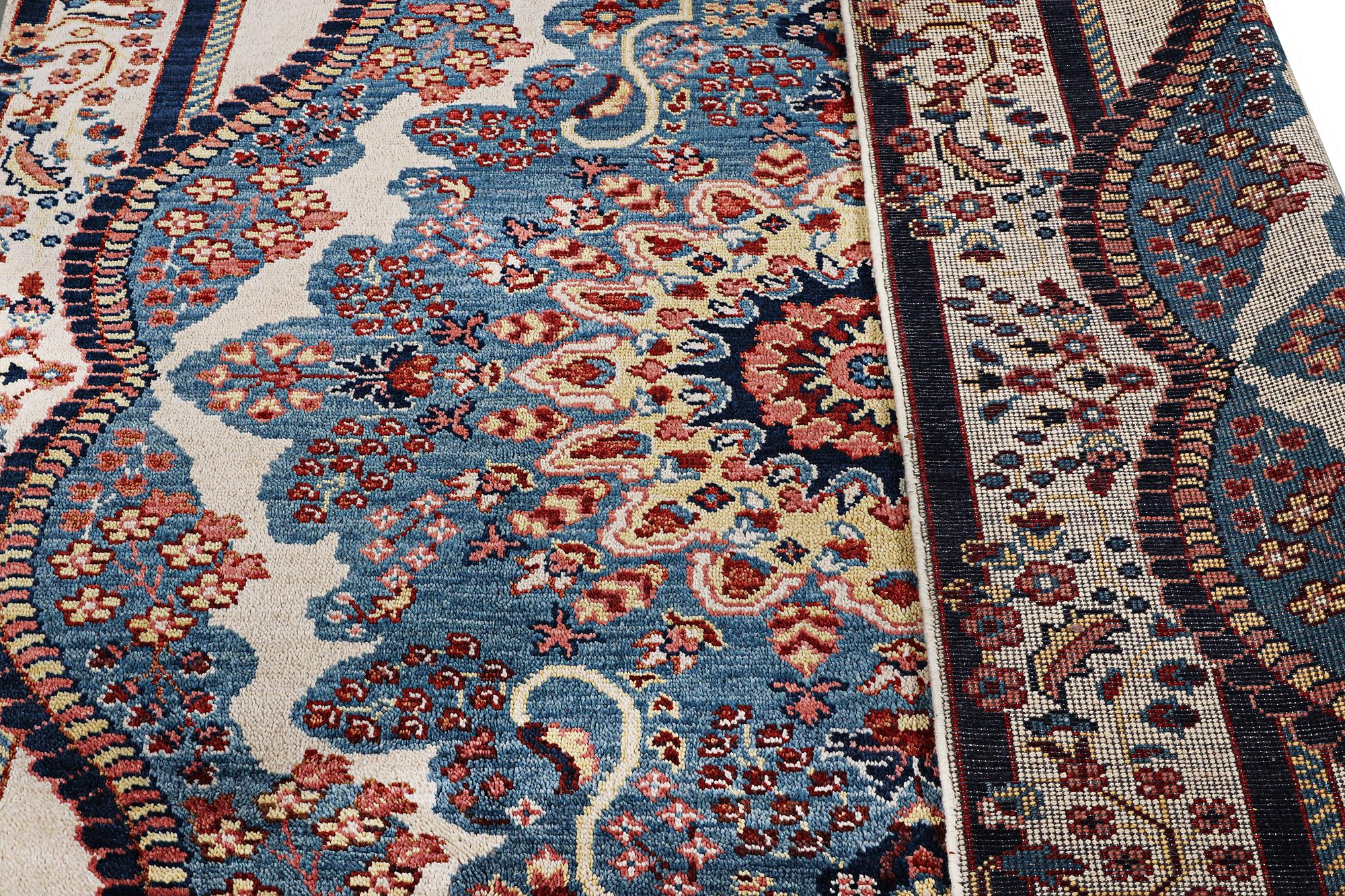 An oriental carpet with Mamluk design, c. 300 x 242 cm.