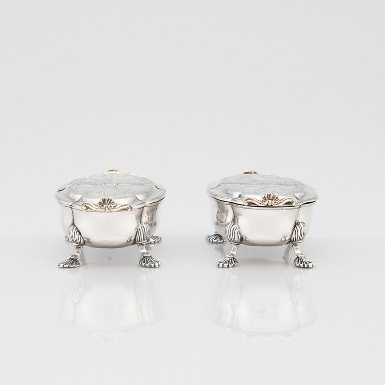 A pair of Latvian Rococo silver salt and pepper stands, marks of Johan Christian Henck (Henke), Riga 1768-80.