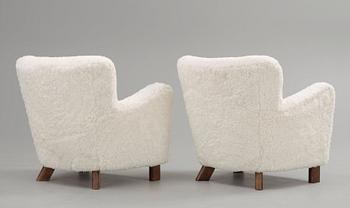 A pair of Fritz Hansen 'Model 1669' armchairs, Denmark.