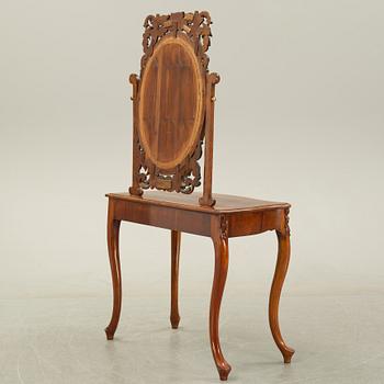 A rococo style dressing table, 19th Century.