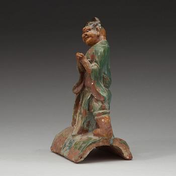 Two green and yellow glazed rofe tile figures, Ming dynasty (1368-1644).