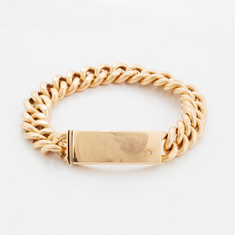 A 14K gold bracelet.