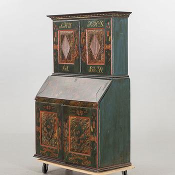 A 19th century cabinet. Dated 1839.