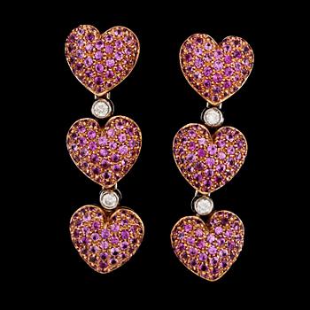 1376. A pair of pink sapphire and brilliant cut diamond earrings.