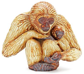 399. A Gunnar Nylund stoneware figure of a gibbon ape with child, Rörstrand.