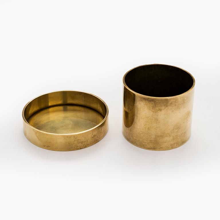 Maija Heikinheimo, a set of two mid-20th century brass jars, manufacturer Valaistustyö for Artek.
