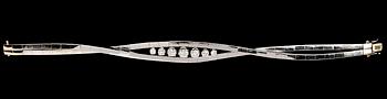 432. ARMBAND, sju briljantslipade diamanter, tot. 1.42 ct.