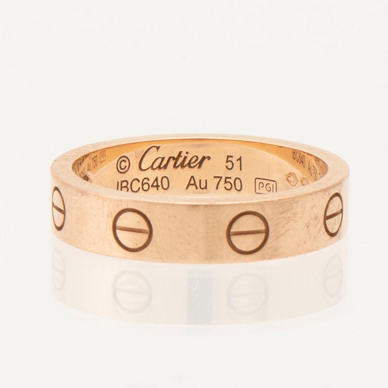 Cartier, ring 18K guld med en rund briljantslipad diamant.