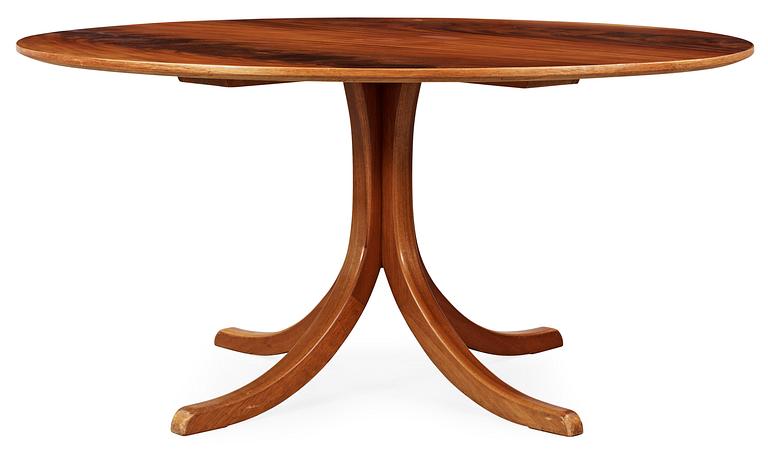A Josef Frank mahogany dinner table by Svenskt Tenn, model 1020.