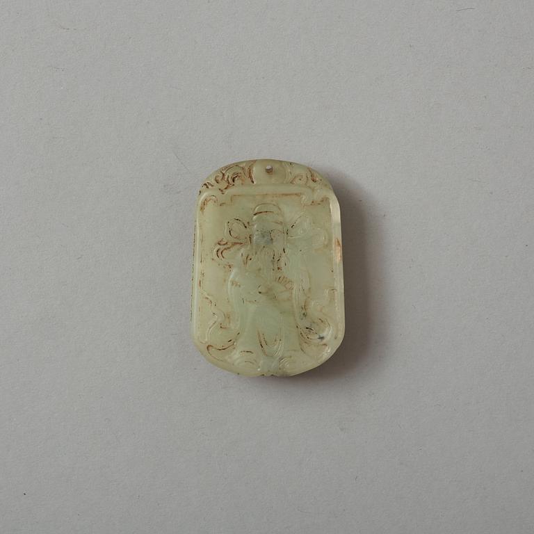 A carved nephrite pendant with the image of Sholaou, early 20th Century.