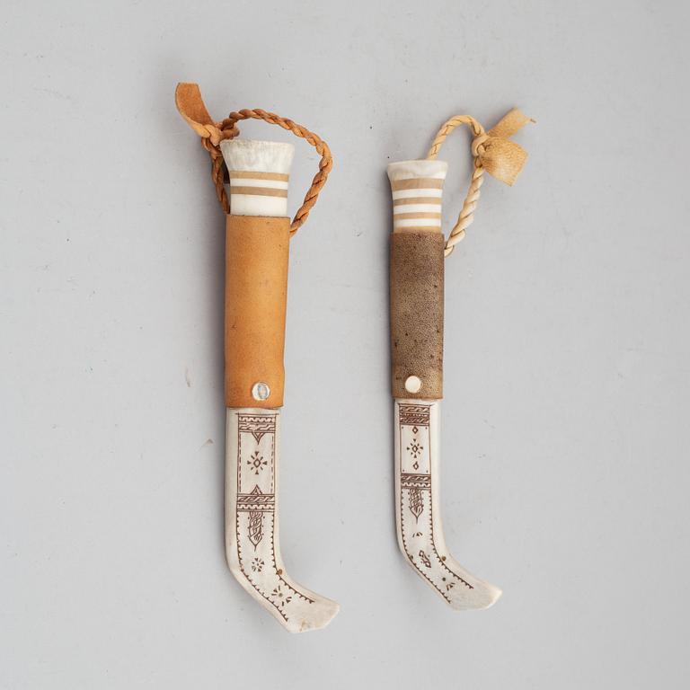 Per Henrik Simmas, two Sami reindeer horn knives, signed.