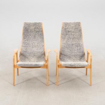 Yngve Ekström, a pair of "Lamino" armchairs for Swedese, late 20th century.