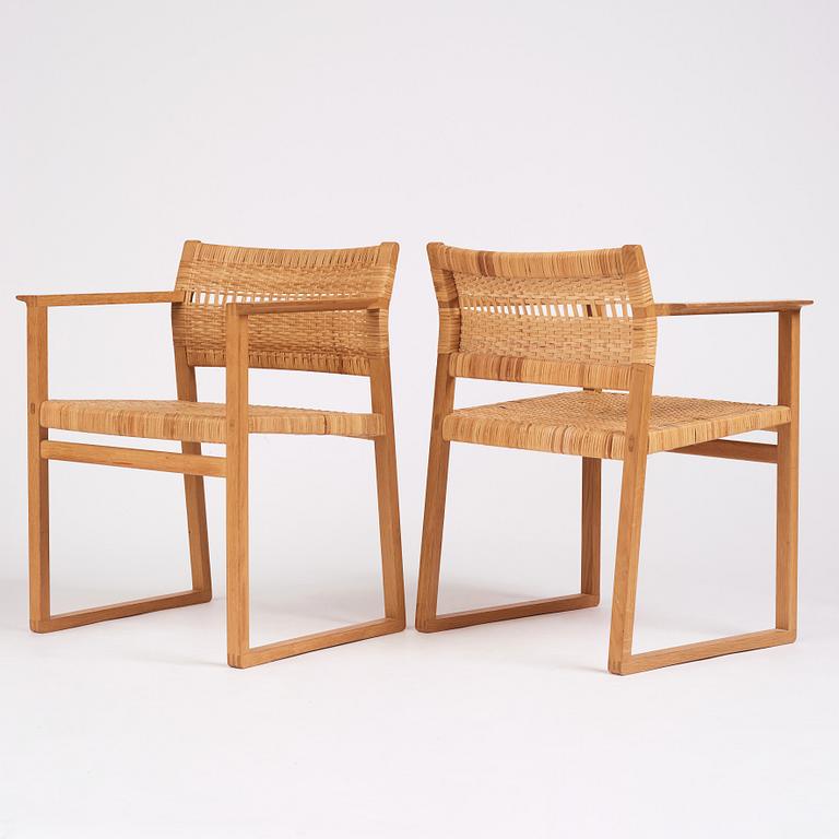 Børge Mogensen, a set of six oak and rattan 'BM61' chairs and a pair of BM62, Fredericia, Denmark, 1950s.