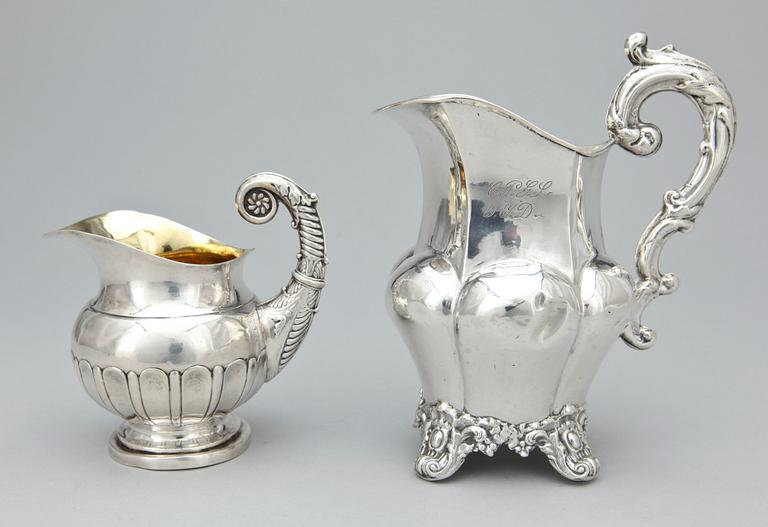 GRÄDDKANNOR, 2 st, silver, bl.a. Anders Lundqvist Stockholm 1839. Total vikt ca 230 gram.