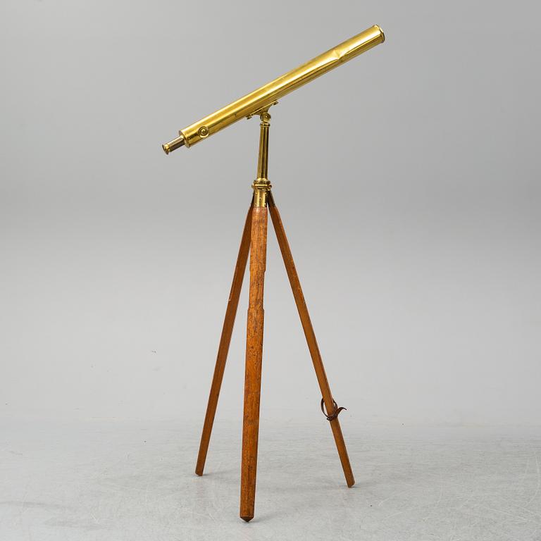 A brass telescope, circa 1900.