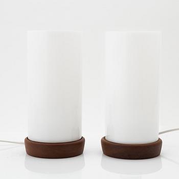 Uno & Östen Kristiansson, a pair of teak and acrylic table lights, Luxus, Vittsjö.