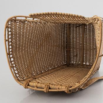 An Indonesian woven rattan backpack, 20th century.