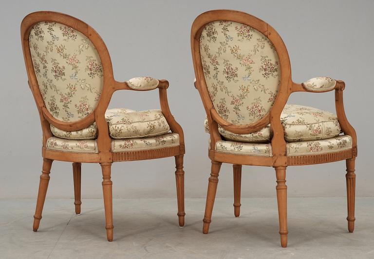 A pair of Louis XVI 18th century armchairs.