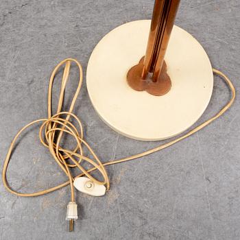 A 20th century Swedish Modern three-armed floor light.