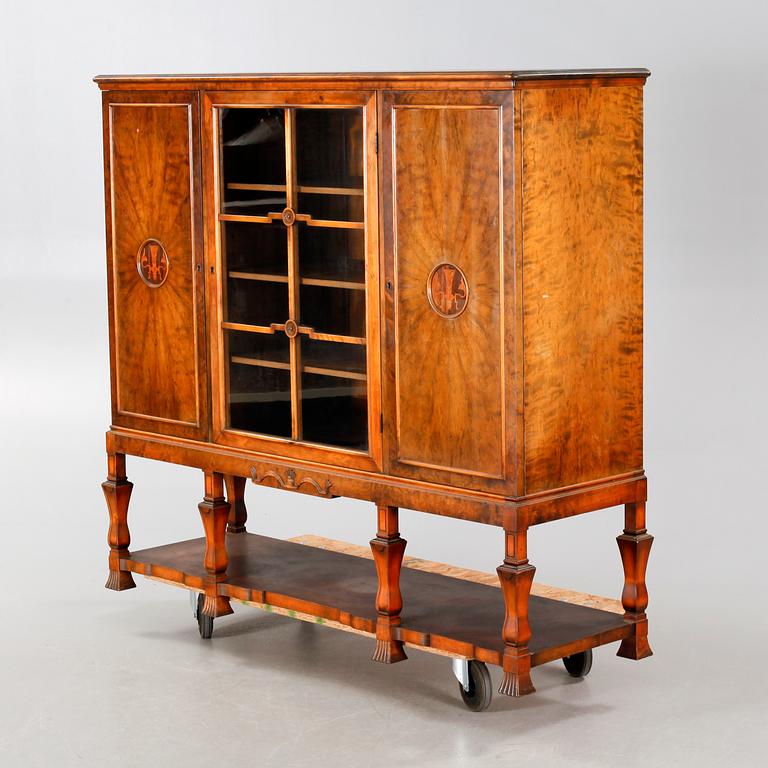 A 1920/30s swedish grace cupboard, model "Sture", made by AB Seffle Möbelfabrik.