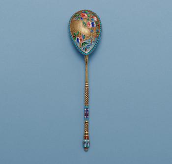 A Russian silver-gilt and enamel spoon, unidentified makers mark, Moscow 1899-1908.