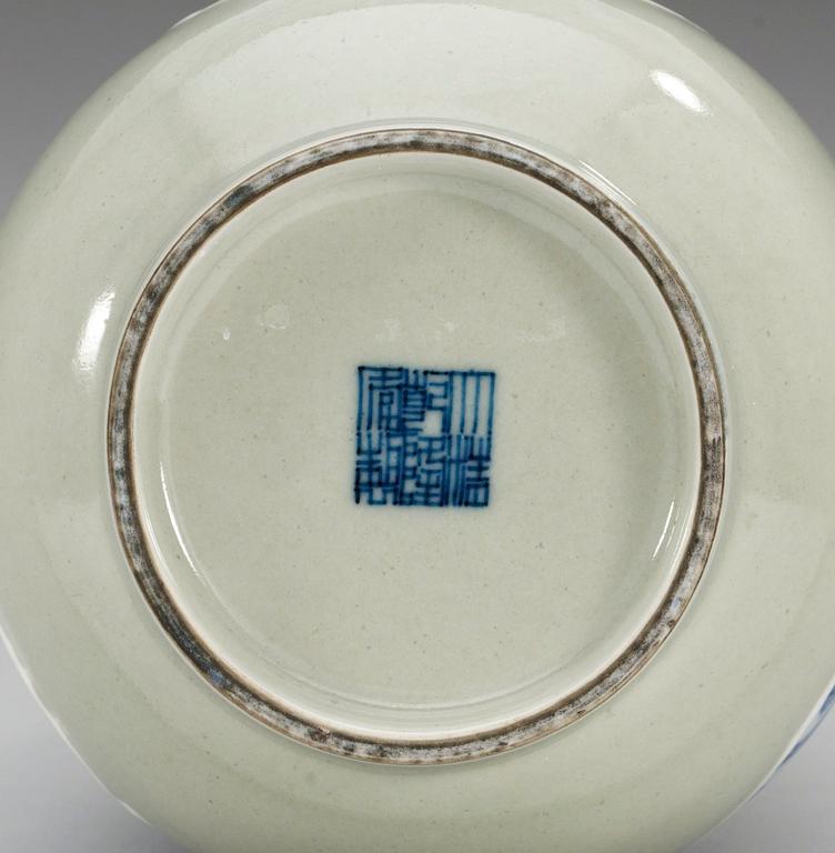 A celadon ground blue and white vase, late Qing dynasty with Qianlongs  mark.