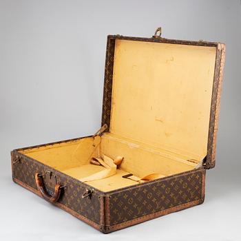 LOUIS VUITTON, a monogram canvas 'Le Loziné' suitcase.