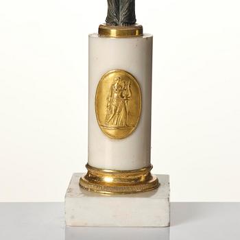 A pair of late Gustavian white marble and bronze candelabra.