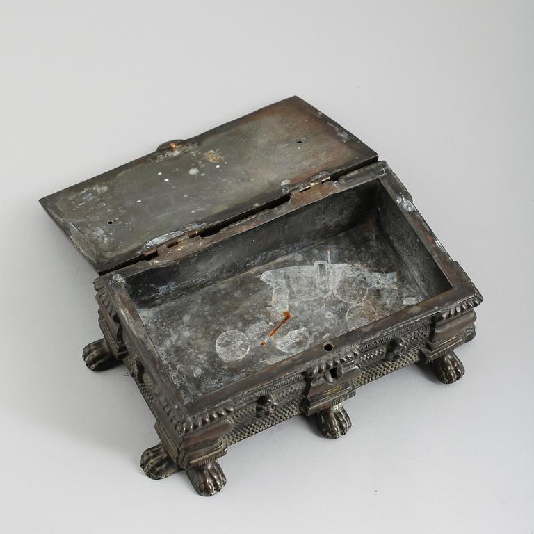 SKRIN, bronserad metall, 1800-talets andra hälft.