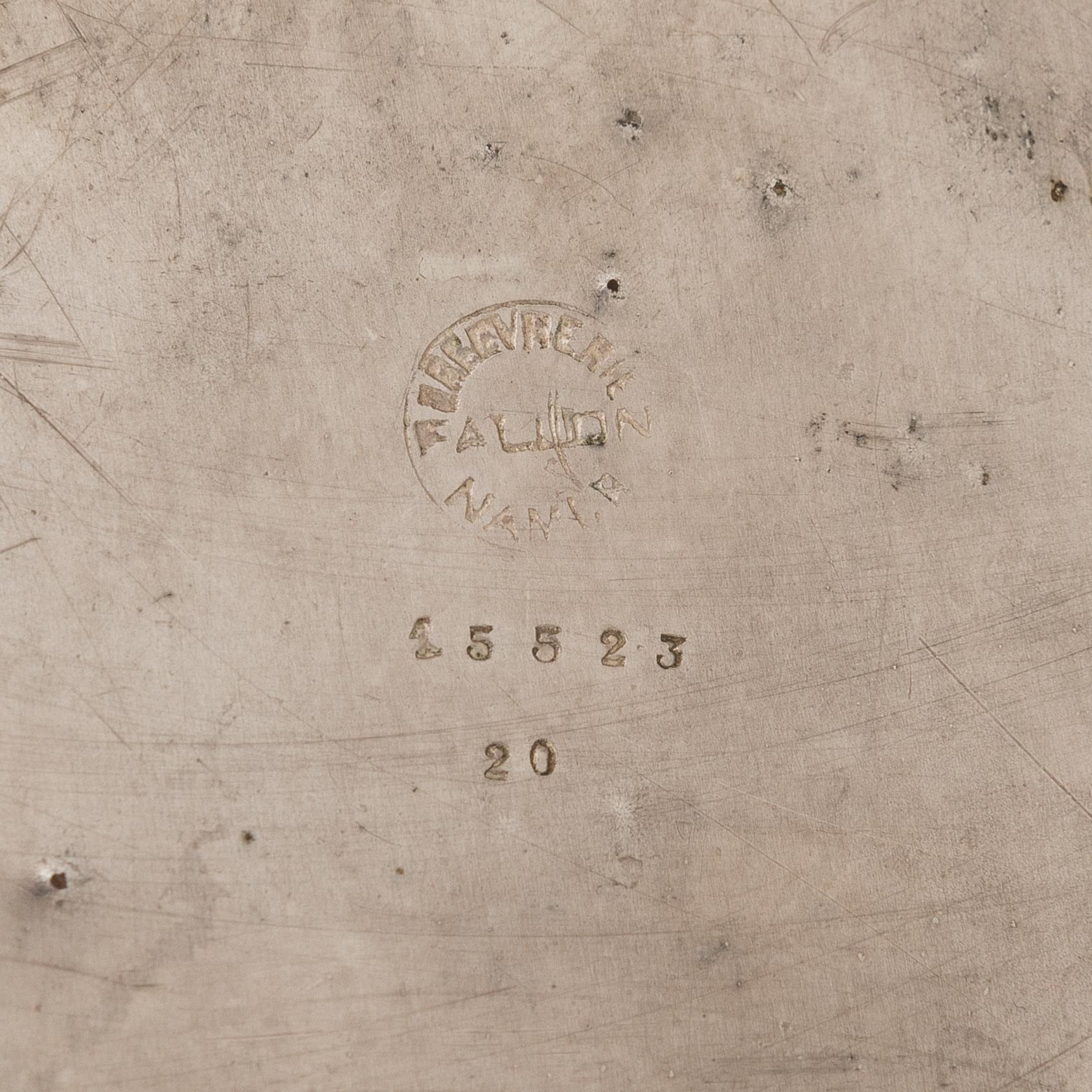 A silver plated brass Charles Heidsieck Champagne cooler.