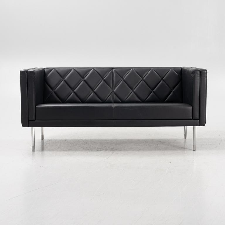 A leather upholstered sofa, 21st Century.