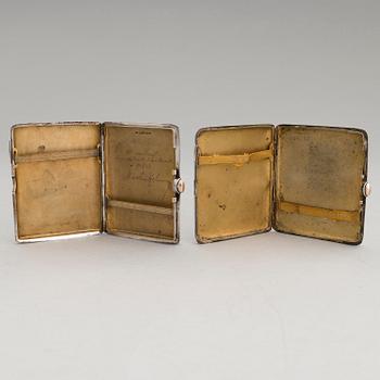 Three silver cigarette cases and a silver pillbox, marked in Finland and Germany, first half of the 20th Century.
