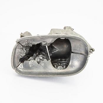 A set of four pewter icecream moulds around 1900.