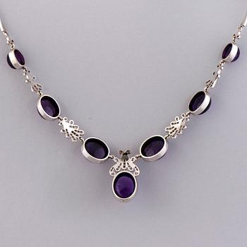 COLLIER, ARMBAND, ÖRHÄNGEN och RING, ametister, diamanter, 18K vitguld och palladium. A. Tillander, 1970-tal.