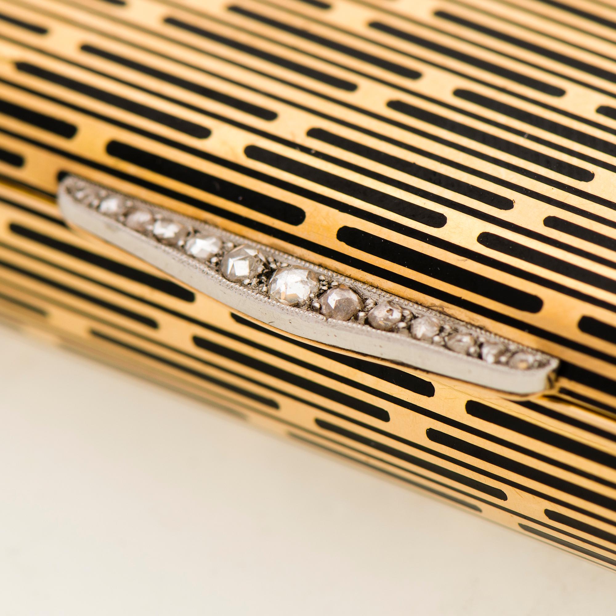 A CARTIER VANITY CASE, 18K gold, enamel, rose cut diamonds. 1930s.