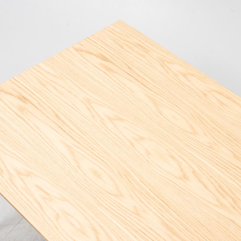 Sami Kallio, an oak veneered 'In Between' dining table from &tradition.