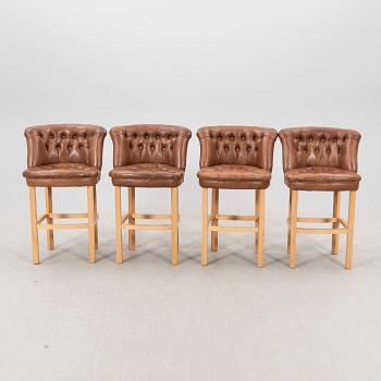 A set of four Milton barstools Lexington 21st century.