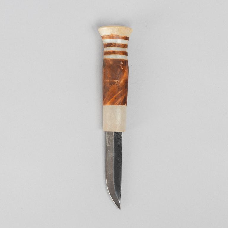 Lars Levi Sunna, a reindeer horn knife, signed.