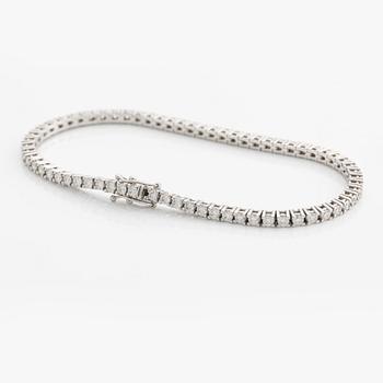 Tennis bracelet, 18K white gold with brilliant-cut diamonds.