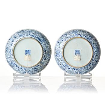 A pair of blue and white 'Phoenix' dishes, Qing dynasty, Daoguang mark and of the period (1821-50).