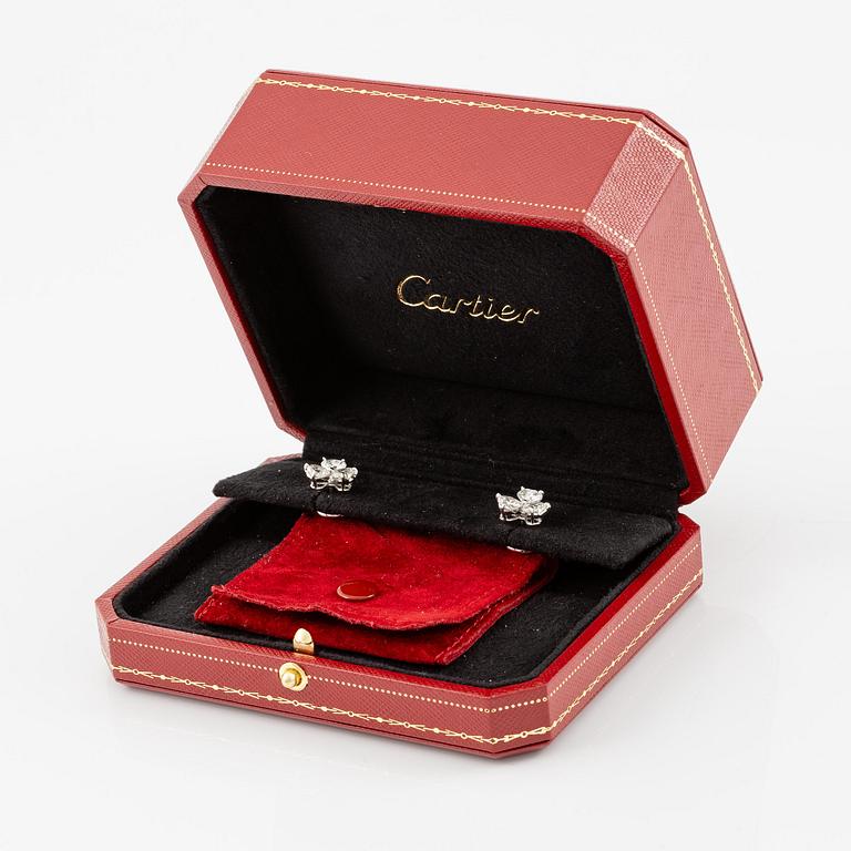 A pair of Cartier earrings in 18K white gold with six heart-shaped brilliant-cut diamonds.